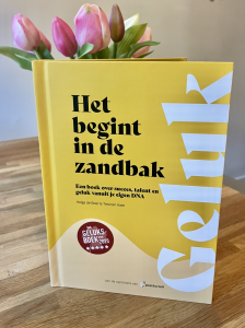 Geluksboek Het begint in de zandbak